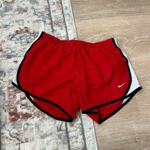 Red Nike shorts